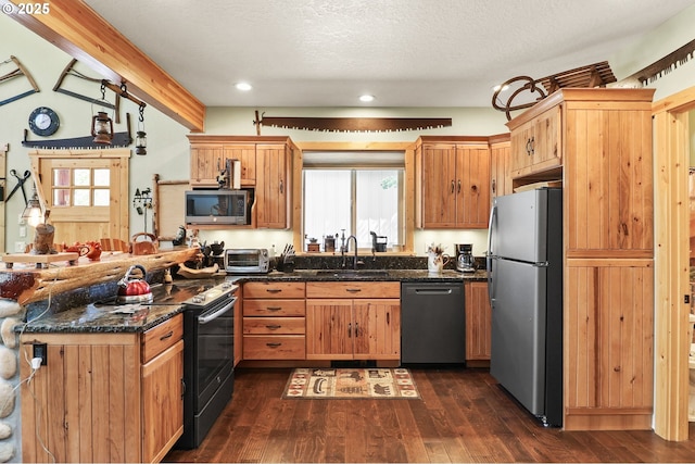 123604 Muttonchop St, Crescent Lake, OR 97733 - kitchen with stainless steel appliances, healthy amount of natural light, a peninsula, dark wood-style flooring, and recessed lighting