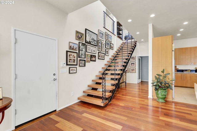 foyer with light hardwood / wood-style flooring