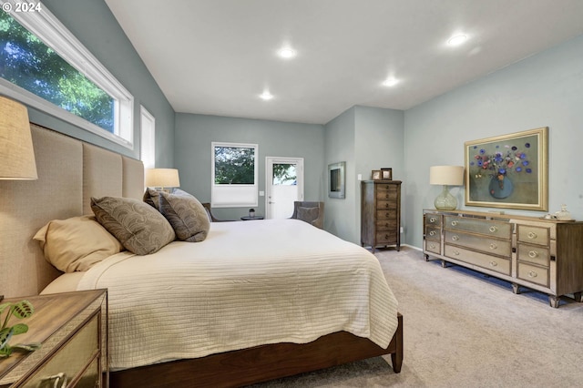 bedroom with light colored carpet