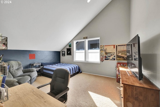 bedroom with vaulted ceiling and light carpet