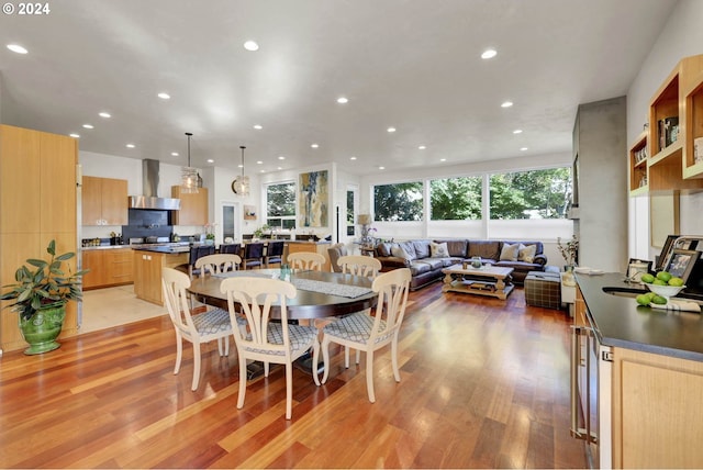 dining room featuring light hardwood / wood-style flooring