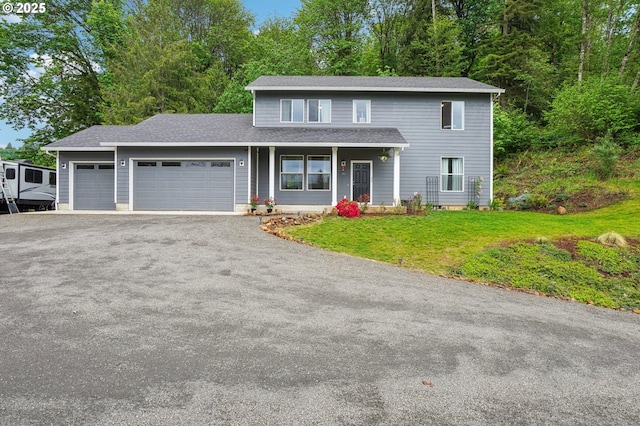 250 Sylvan Way, Longview, WA 98632 - traditional-style home with a garage, a front yard, driveway, a porch, and a shingled roof