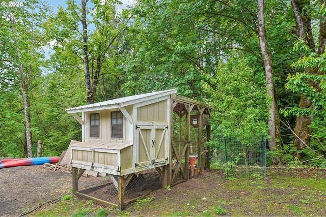 250 Sylvan Way, Longview, WA 98632 - view of poultry coop featuring a view of trees
