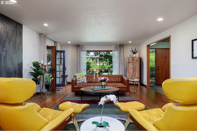 living room with recessed lighting and wood finished floors