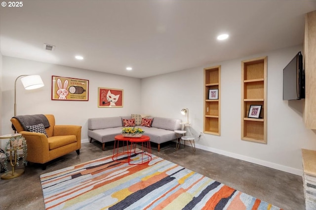living area featuring recessed lighting, baseboards, visible vents, and built in shelves