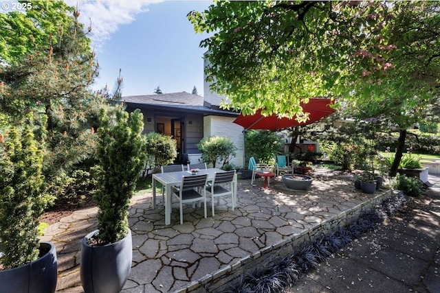 view of patio featuring outdoor dining space