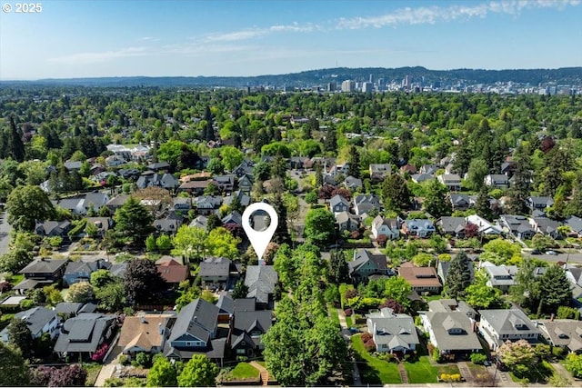 birds eye view of property with a residential view