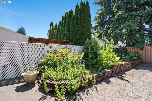 view of yard featuring fence