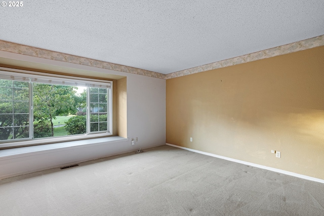 7785 SW Fairway Dr, Wilsonville, OR 97070 - empty room with a textured ceiling, carpet floors, and baseboards