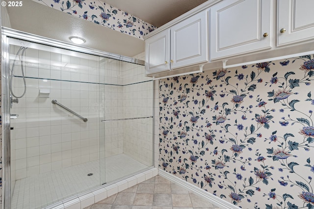 7785 SW Fairway Dr, Wilsonville, OR 97070 - full bathroom featuring a stall shower, tile patterned floors, and baseboards