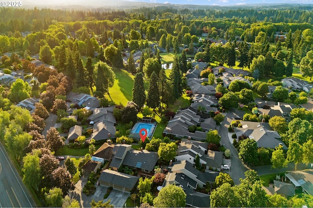 7785 SW Fairway Dr, Wilsonville, OR 97070 - aerial view of residential area with a heavily wooded area