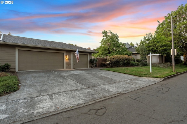 7785 SW Fairway Dr, Wilsonville, OR 97070 - view of front facade with driveway, a chimney, and a garage