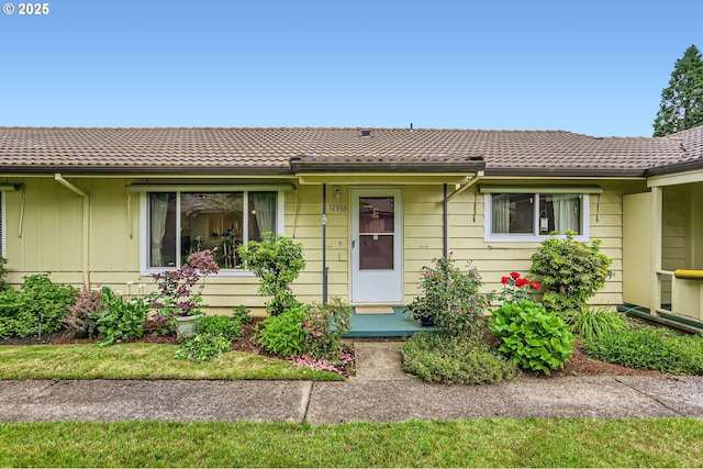 12330 SE Main St, Portland, OR 97233 - ranch-style house featuring board and batten siding