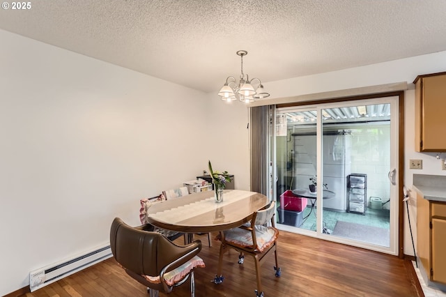 12330 SE Main St, Portland, OR 97233 - dining space with a chandelier, wood finished floors, a baseboard radiator, and a textured ceiling