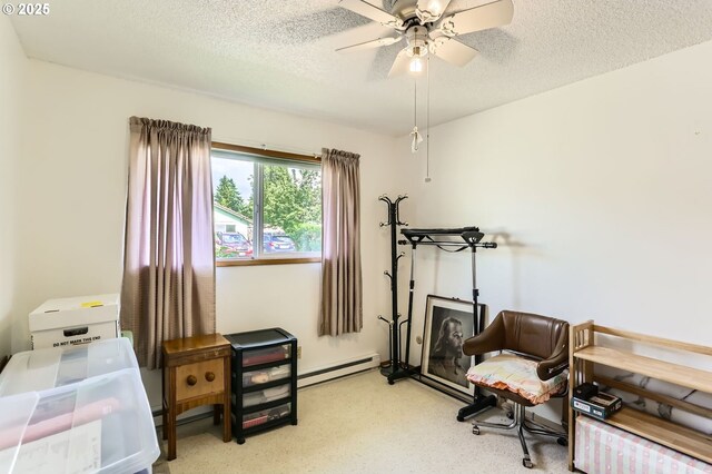 12330 SE Main St, Portland, OR 97233 - exercise area featuring baseboard heating, a textured ceiling, and a ceiling fan