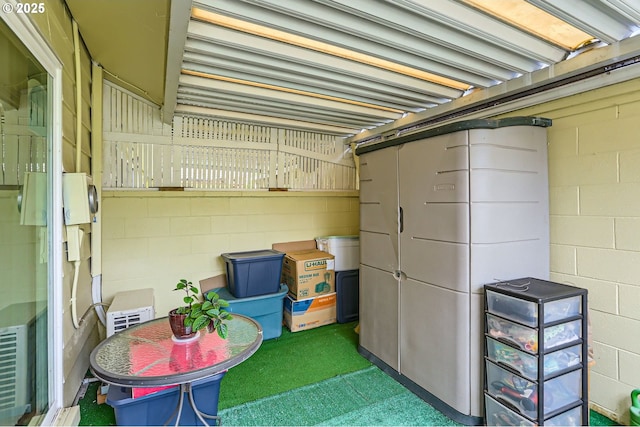 12330 SE Main St, Portland, OR 97233 - finished basement with concrete block wall and tile patterned floors