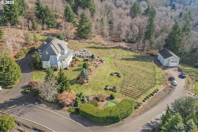 birds eye view of property featuring a rural view