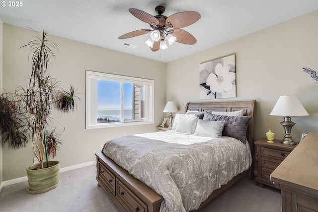 carpeted bedroom with ceiling fan