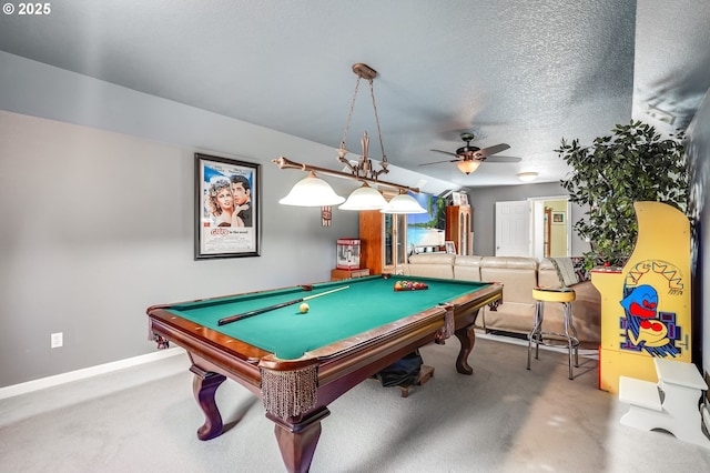 playroom with ceiling fan, carpet floors, pool table, and a textured ceiling