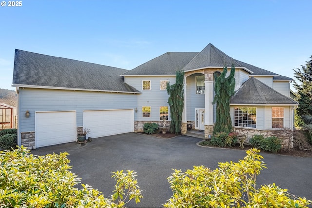 view of front of home with a garage