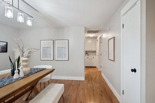 unfurnished bedroom with hardwood / wood-style floors and a closet