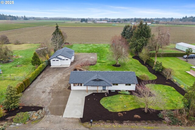 single story home with a garage and an outdoor structure