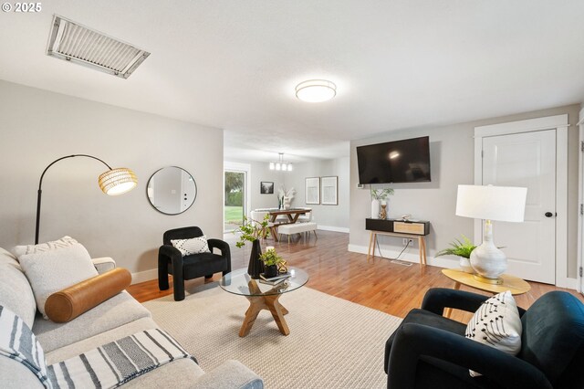 living room with wood-type flooring