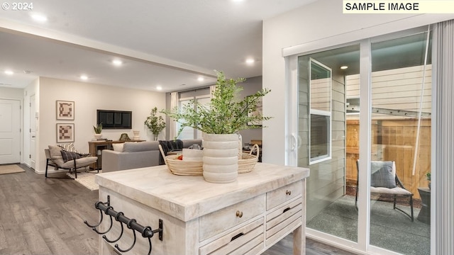 interior space featuring dark wood-type flooring and recessed lighting