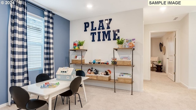 home office featuring carpet floors, baseboards, and visible vents