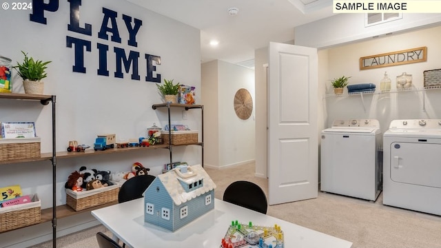 washroom with recessed lighting, light carpet, laundry area, visible vents, and washing machine and clothes dryer