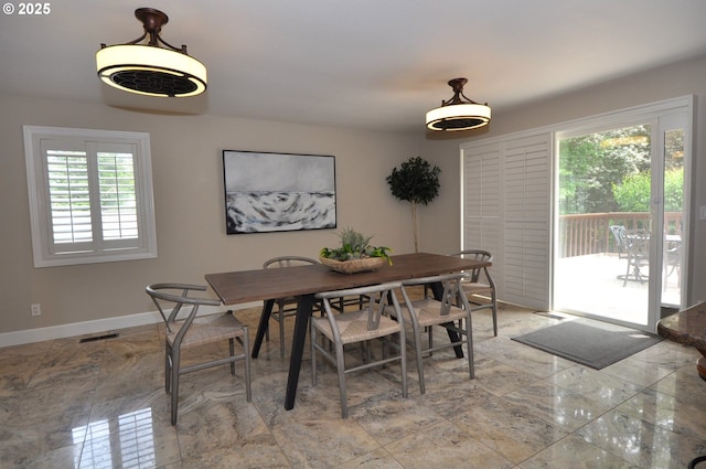 13950 SW Barlow Rd, Beaverton, OR 97008 - dining room featuring plenty of natural light and baseboards