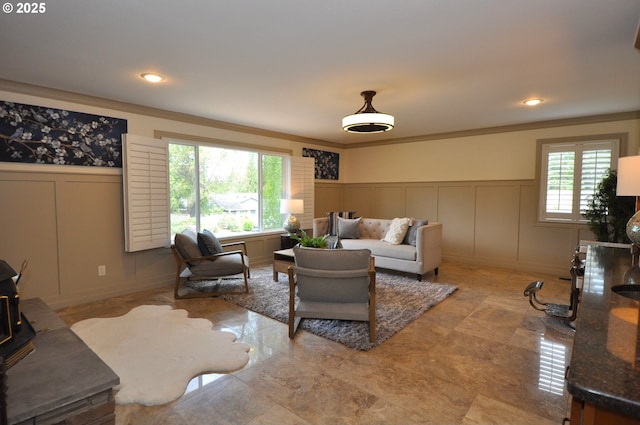 13950 SW Barlow Rd, Beaverton, OR 97008 - living room with a decorative wall, wainscoting, and crown molding
