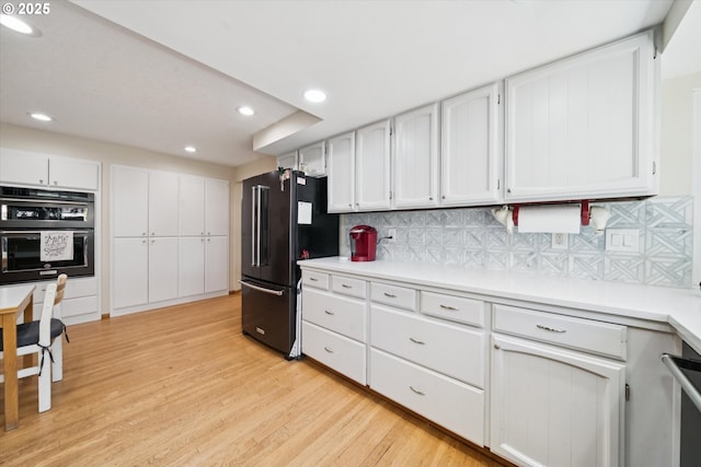 11820 SW Reid Ct, Beaverton, OR 97008 - kitchen featuring freestanding refrigerator, double oven, recessed lighting, light wood-style flooring, and white cabinetry