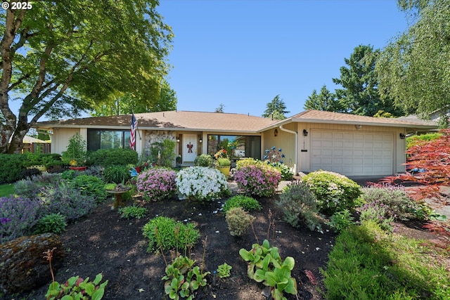11820 SW Reid Ct, Beaverton, OR 97008 - ranch-style house with a garage