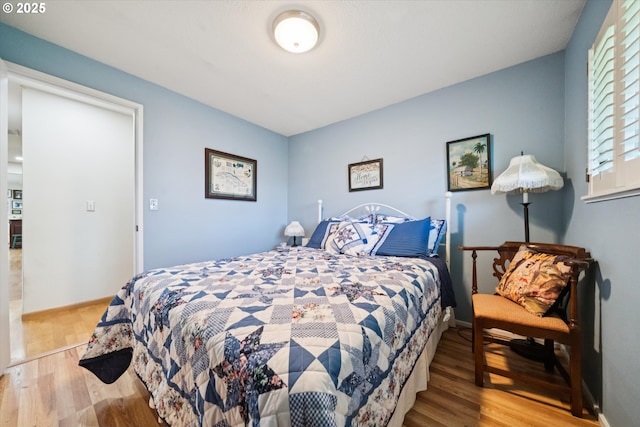 11820 SW Reid Ct, Beaverton, OR 97008 - bedroom with wood finished floors and baseboards