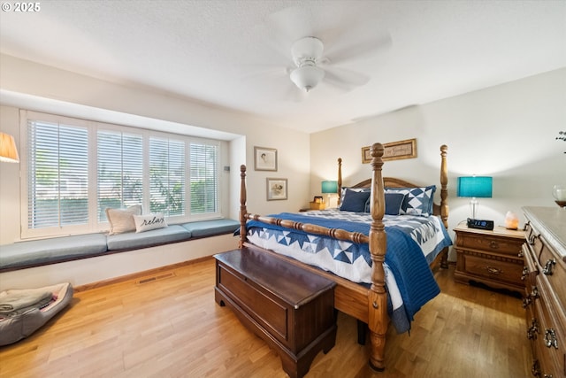 11820 SW Reid Ct, Beaverton, OR 97008 - bedroom with light wood-style floors and a ceiling fan