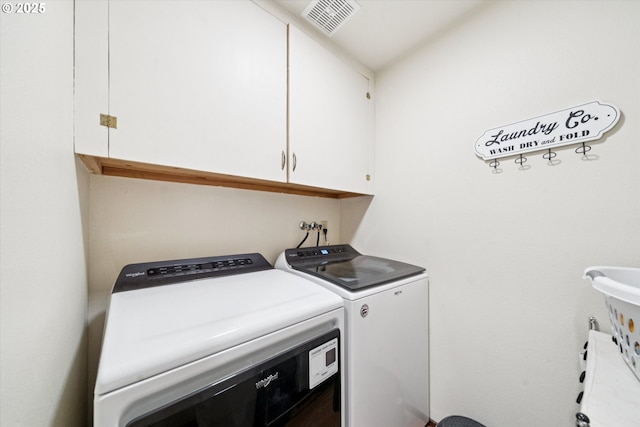 11820 SW Reid Ct, Beaverton, OR 97008 - washroom featuring cabinet space and washer and dryer