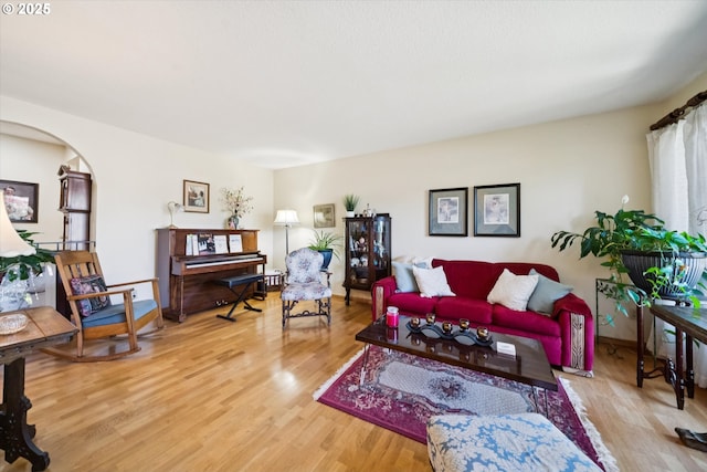 11820 SW Reid Ct, Beaverton, OR 97008 - living area featuring wood finished floors and arched walkways