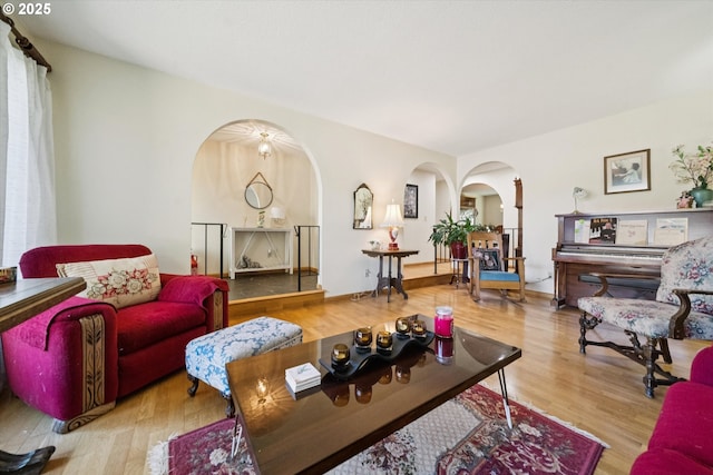 11820 SW Reid Ct, Beaverton, OR 97008 - living room with arched walkways and wood finished floors
