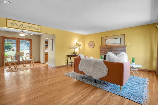 3116 Vista Dr, Forest Grove, OR 97116 - living room with baseboards, light wood-style floors, and ceiling fan