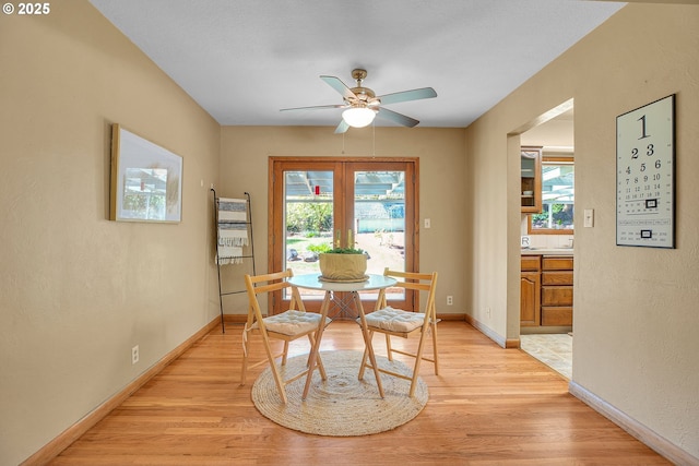 3116 Vista Dr, Forest Grove, OR 97116 - dining room featuring light wood-style flooring, baseboards, and ceiling fan