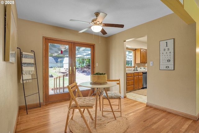 3116 Vista Dr, Forest Grove, OR 97116 - dining space featuring light wood finished floors, baseboards, ceiling fan, and french doors