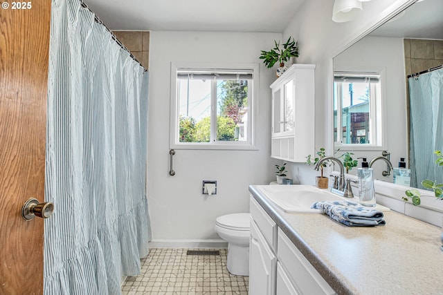 3116 Vista Dr, Forest Grove, OR 97116 - bathroom featuring toilet, vanity, visible vents, and baseboards