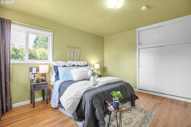 3116 Vista Dr, Forest Grove, OR 97116 - bedroom featuring light wood-style flooring, baseboards, and a closet