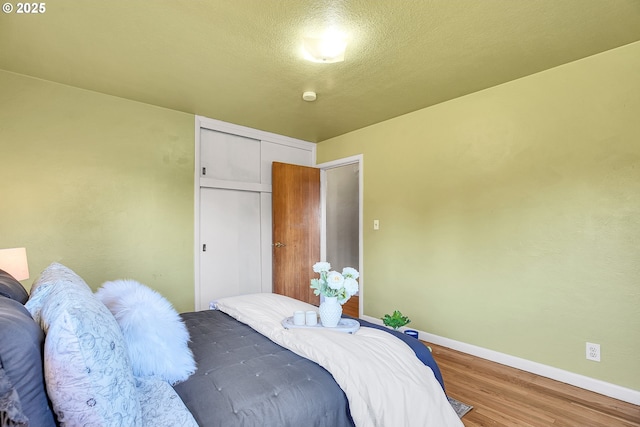 3116 Vista Dr, Forest Grove, OR 97116 - bedroom featuring wood finished floors, a closet, and baseboards