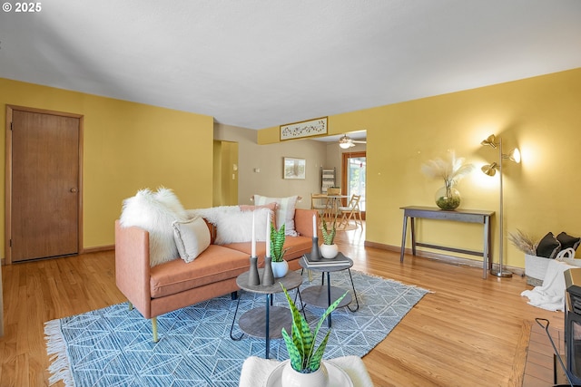 3116 Vista Dr, Forest Grove, OR 97116 - living room with wood finished floors, a ceiling fan, and baseboards