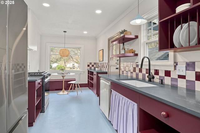 kitchen with dark countertops, a sink, stainless steel appliances, and open shelves