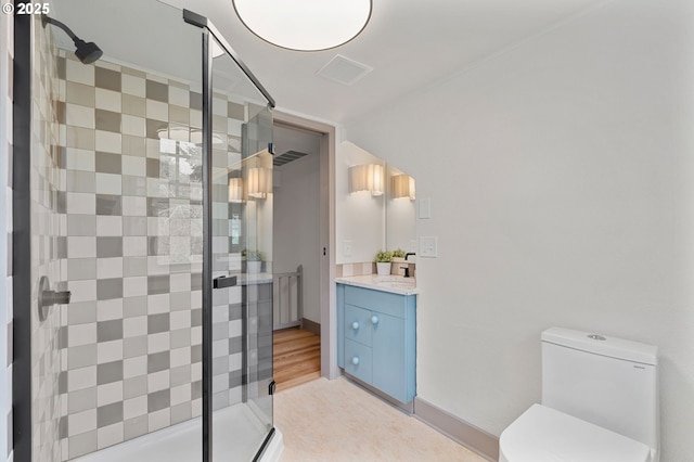 full bath with visible vents, vanity, toilet, and a shower stall