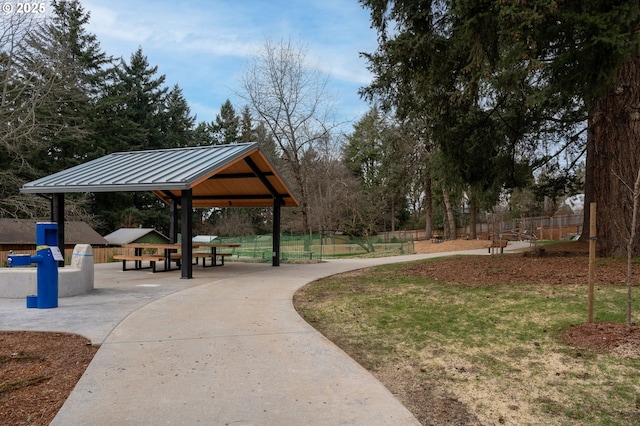 surrounding community featuring a gazebo and fence