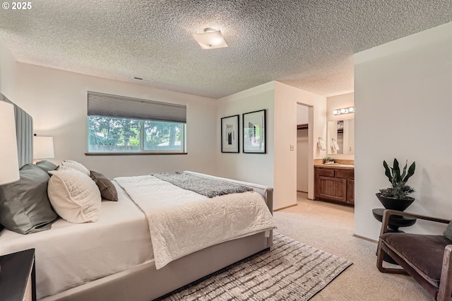14905 SE Stevenson Dr, Vancouver, WA 98683 - bedroom featuring light carpet, ensuite bathroom, and a textured ceiling